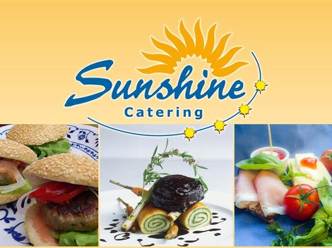 An appealing catering image with fresh and diverse dishes. The atmosphere is inviting and lively, ideal for events.